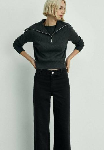 Клешеные джинсы