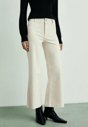 Клешеные джинсы