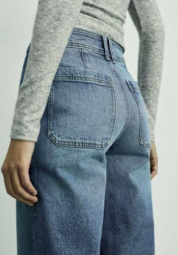 Клешеные джинсы