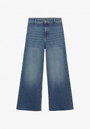 Клешеные джинсы