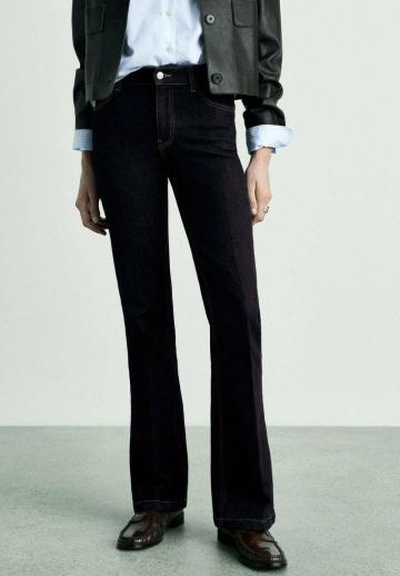 Клешеные джинсы