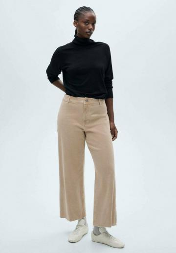 Клешеные джинсы