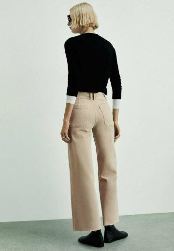 Клешеные джинсы