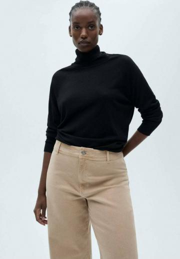 Клешеные джинсы