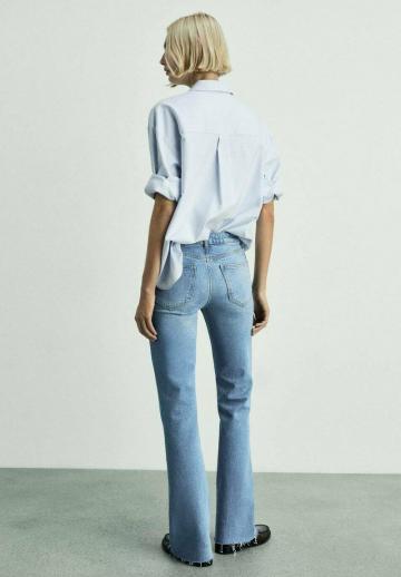 Клешеные джинсы