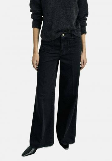 Клешеные джинсы