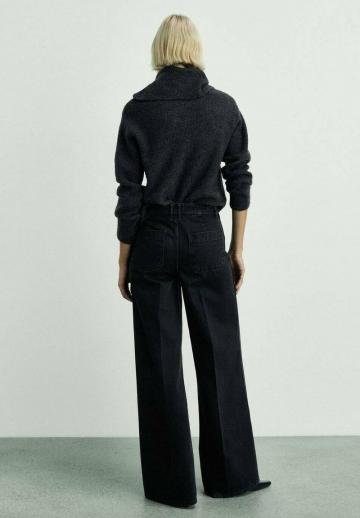 Клешеные джинсы