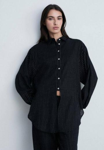 Длинная блузка