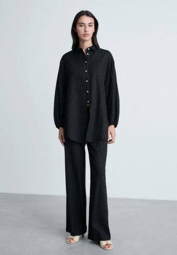 Длинная блузка