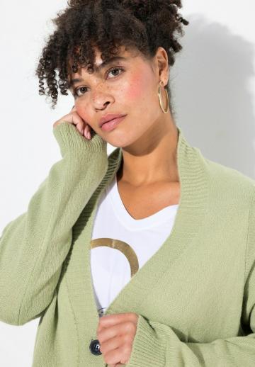 Длинный жилет