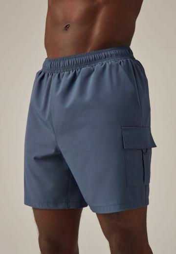 Брюки с накладными карманами