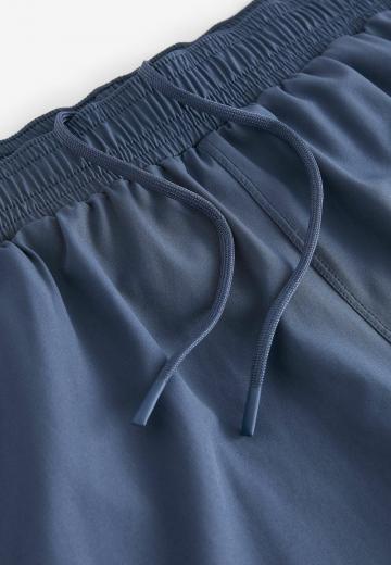 Брюки с накладными карманами