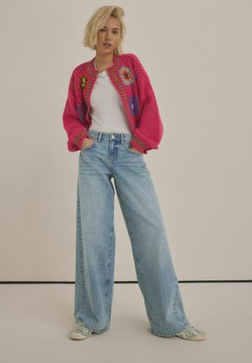 Клешеные джинсы