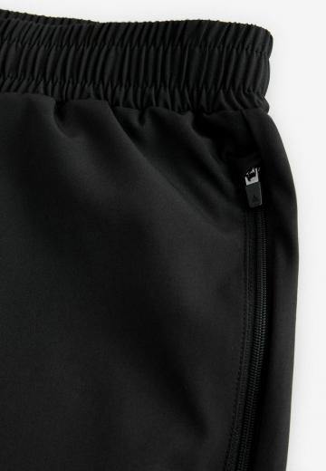 Брюки с накладными карманами