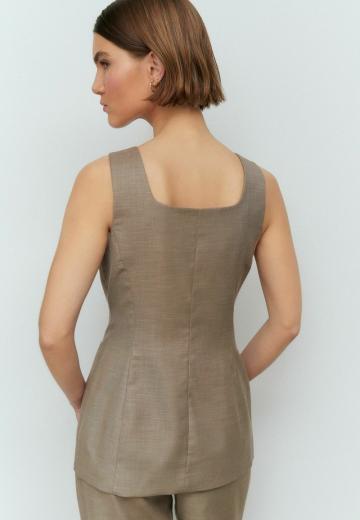 Длинный жилет