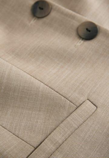 Длинный жилет