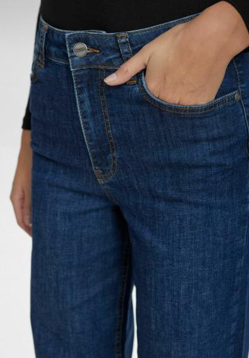 Клешеные джинсы