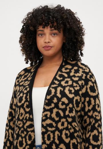 Длинный жилет