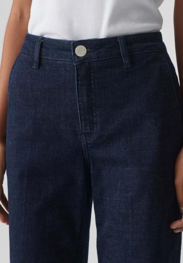 Клешеные джинсы