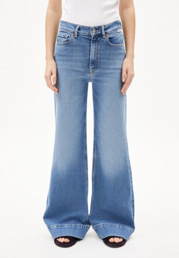Клешеные джинсы
