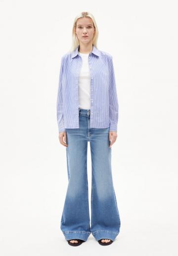 Клешеные джинсы