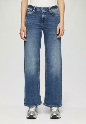 Клешеные джинсы