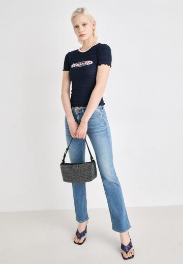 Клешеные джинсы