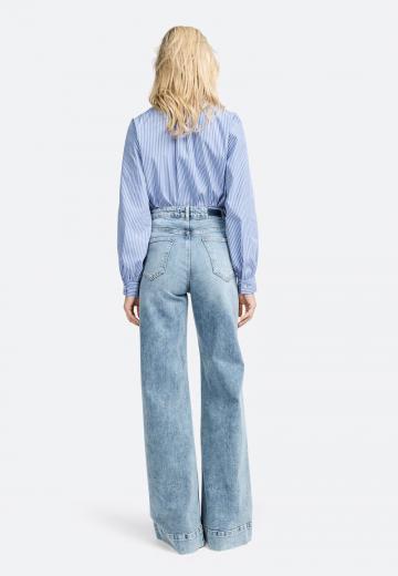 Клешеные джинсы