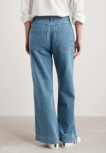 Клешеные джинсы