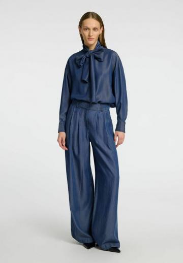 Клешеные джинсы