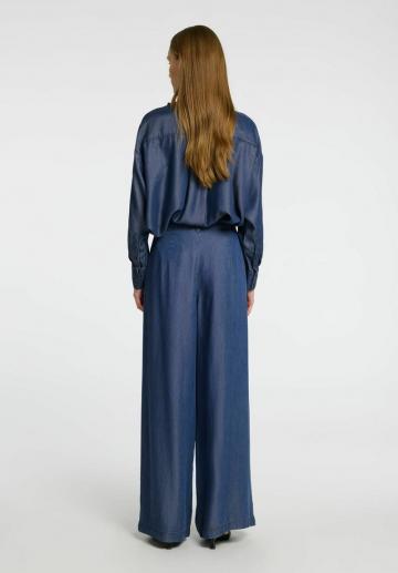 Клешеные джинсы