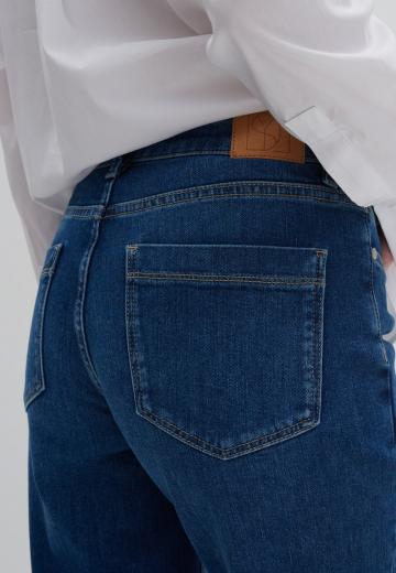 Клешеные джинсы