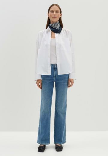 Клешеные джинсы