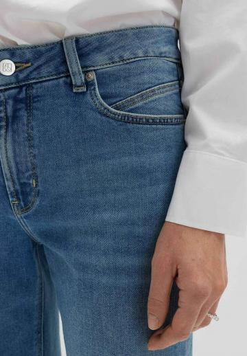 Клешеные джинсы