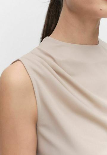 Блузка без рукавов