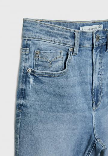 Клешеные джинсы