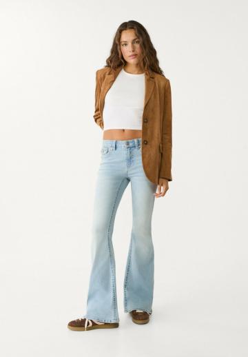 Клешеные джинсы