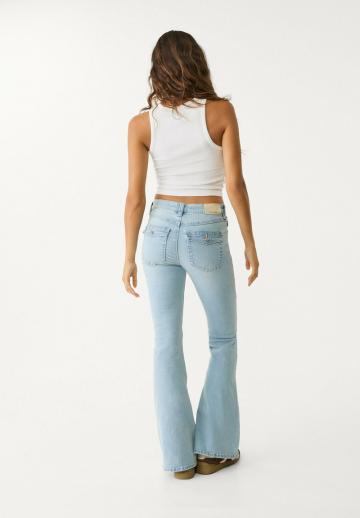 Клешеные джинсы