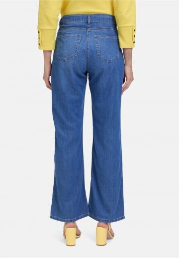 Клешеные джинсы