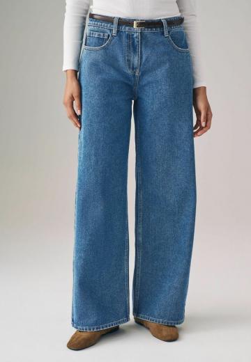 Клешеные джинсы