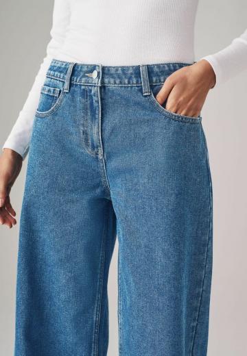 Клешеные джинсы