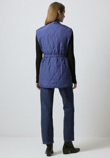 Длинный жилет