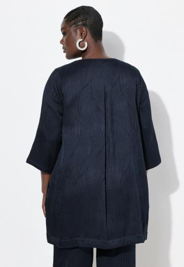 Длинный жилет