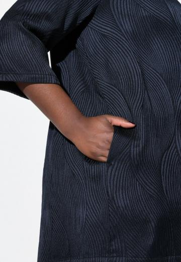 Длинный жилет