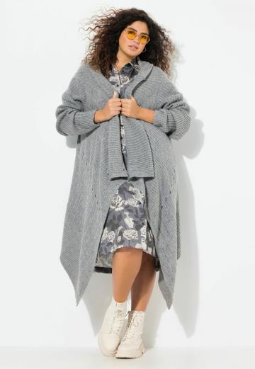 Длинный жилет