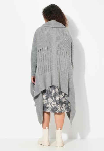 Длинный жилет