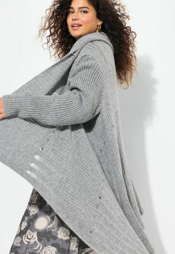 Длинный жилет