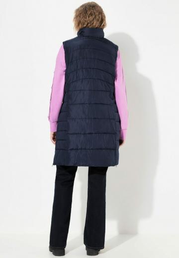 Длинный жилет