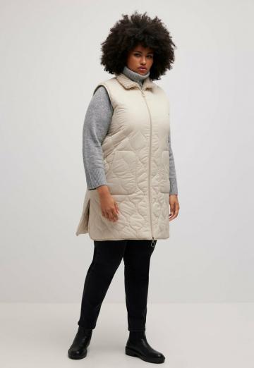 Длинный жилет