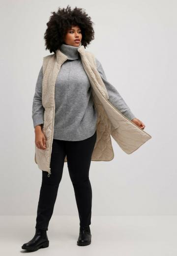 Длинный жилет